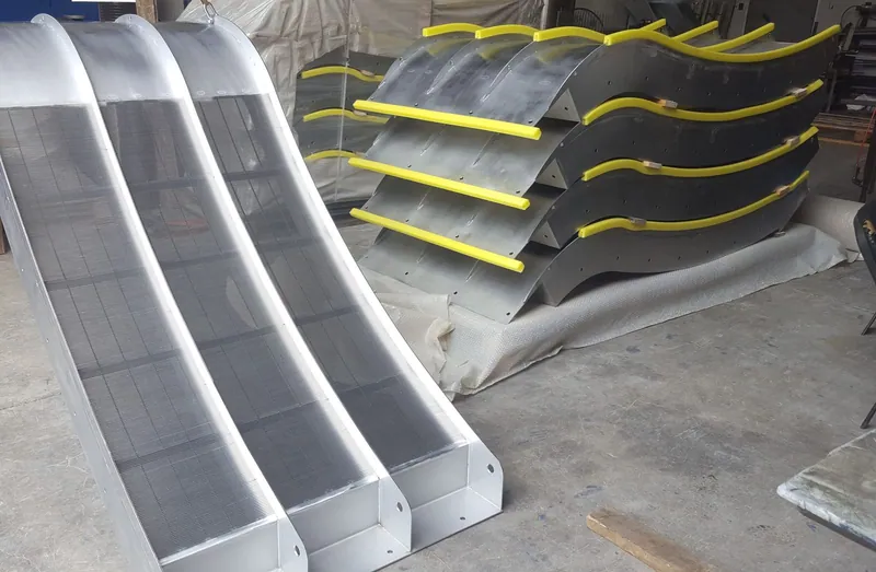 Completed Coanda intake screens on the Istanbul factory floor awaiting factory acceptance, with protective sleeves fitted to the support ribs